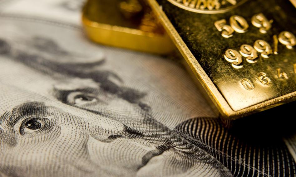 Fed wraz z dolarem tłamszą złoto i srebro