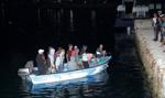 Uchodźcy przypłynęli na włoską wyspę Lampedusa przebrani za turystów