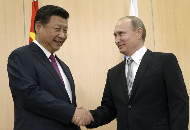 Prezydent Chin Xi Jinping i prezydent Rosji Władimir Putin
