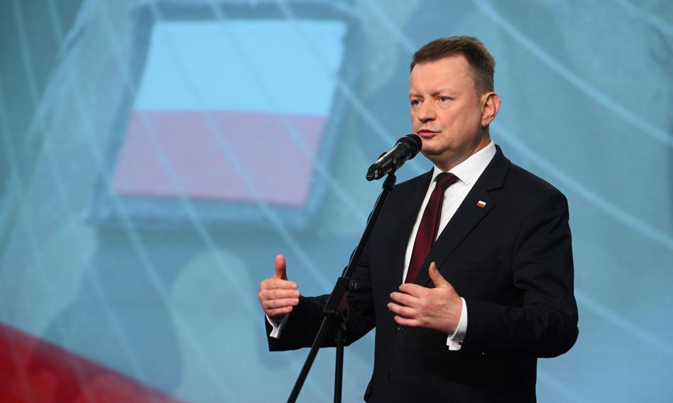 Błaszczak: Pakt migracyjny UE zagraża Polsce